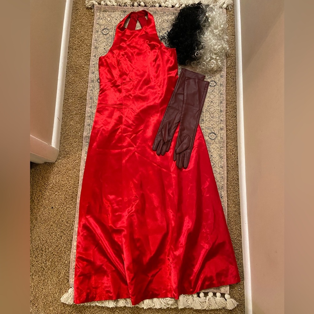 Cruella costume with long red satin dress, wig, and long burgundy gloves!